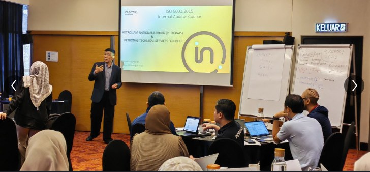 Irvin T. delivering ISO 9001 Internal Auditor training for Petronas teams